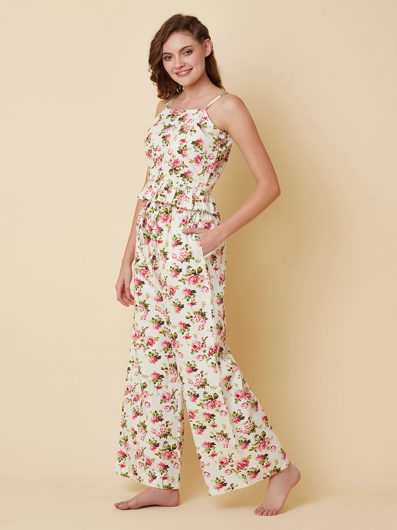 A floral printed cotton night suit for women is a comfortable and stylish sleepwear option that features a soft, breathable cotton fabric and a beautiful floral print design. This night suit for women consists of a relaxed fit style matching set of a top and bottom.  The cotton fabric used in the night suit is highly absorbent, which means it can effectively absorb sweat and keep you feeling fresh and cool throughout the night.