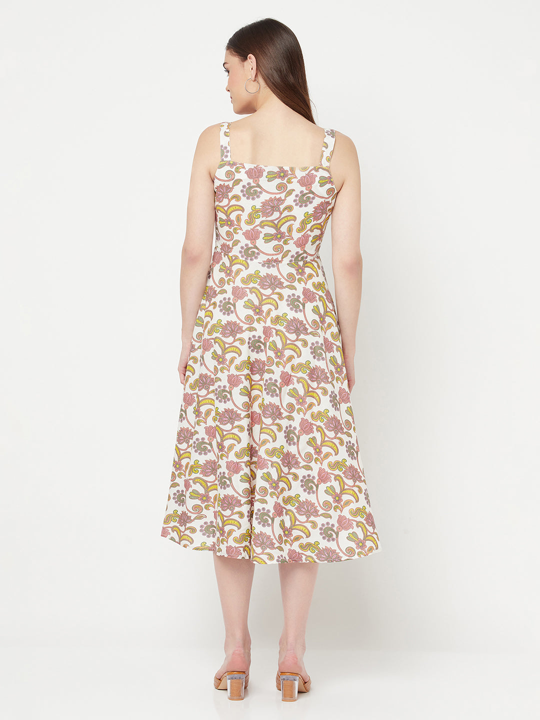 Pink floral maxi dress in Cotton. Crafted with strappy details on shoulder. This  sleeveless dress comes with a circular flare & Maxi length.