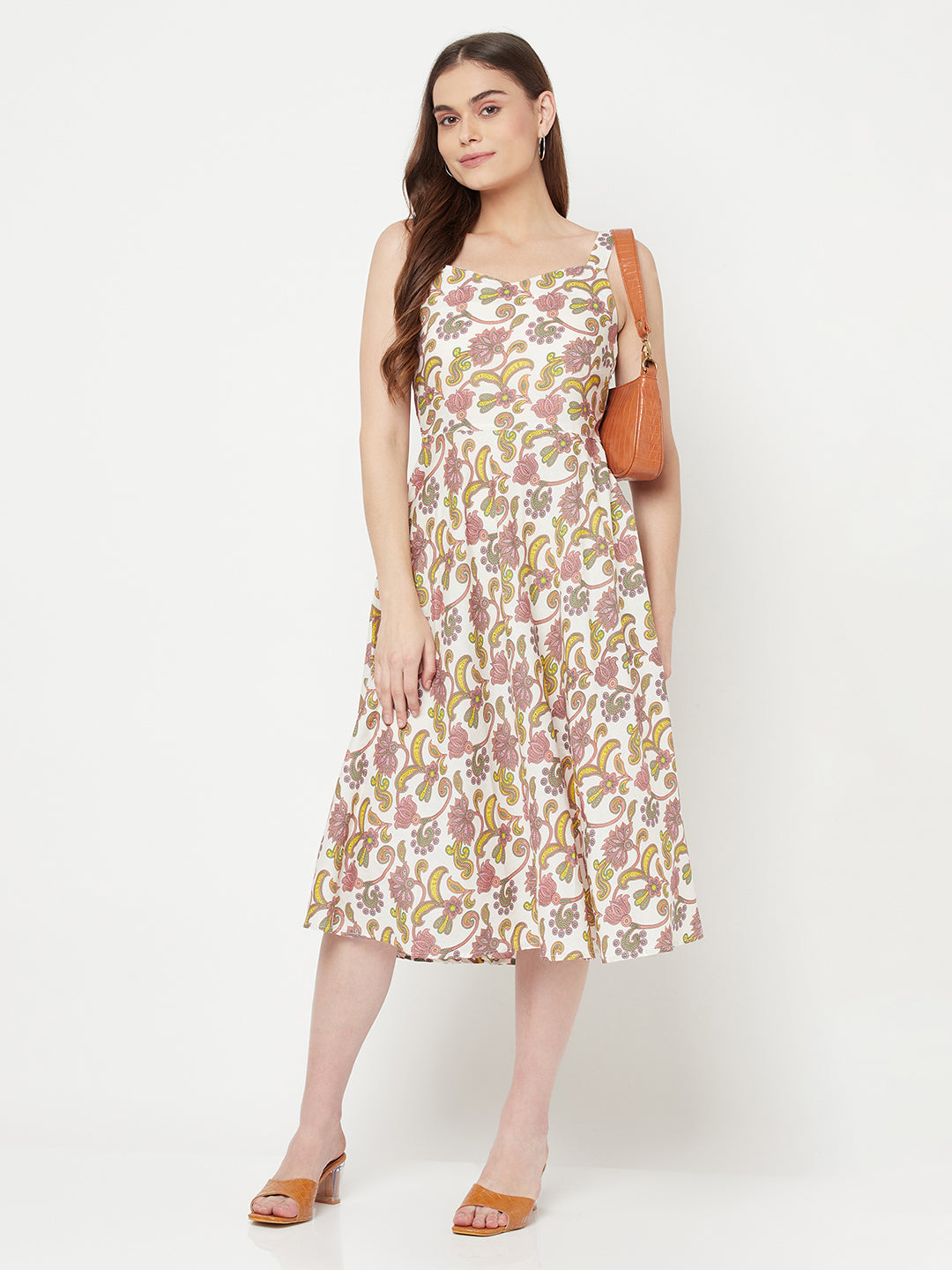 Pink floral maxi dress in Cotton. Crafted with strappy details on shoulder. This  sleeveless dress comes with a circular flare & Maxi length.