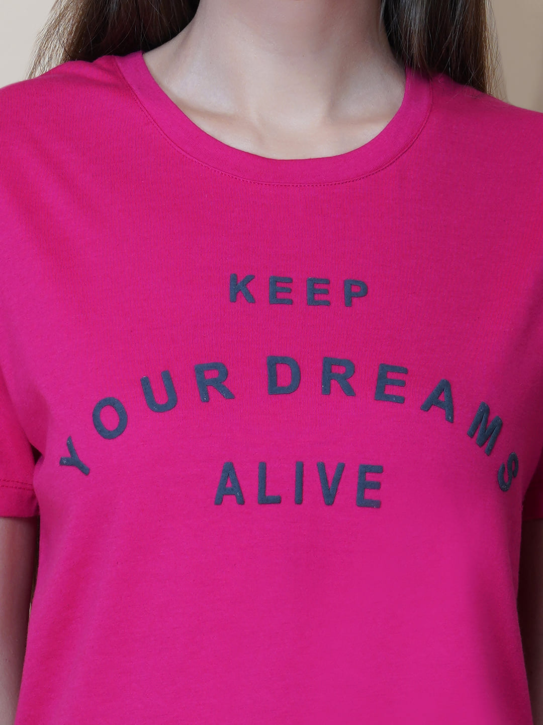 A quote T-shirt for women in pink color is the perfect addition to any fashion-conscious woman's wardrobe. Made from soft and comfortable fabric, this T-shirt is designed to provide a relaxed fit and a comfortable feel. The pink color of the shirt adds a touch of feminine charm to the overall look, making it an ideal choice for those who love to express their femininity in a subtle yet stylish way.