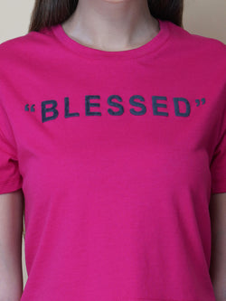 A quote T-shirt for women in pink color is the perfect addition to any fashion-conscious woman's wardrobe. Made from soft and comfortable fabric, this T-shirt is designed to provide a relaxed fit and a comfortable feel. The pink color of the shirt adds a touch of feminine charm to the overall look, making it an ideal choice for those who love to express their femininity in a subtle yet stylish way.