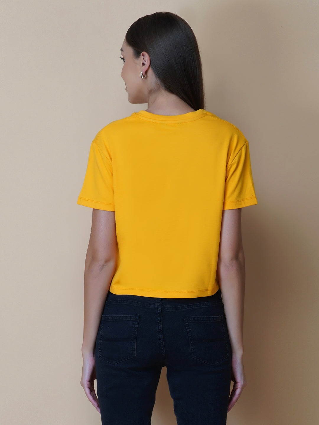 This women's t-shirt features a vibrant yellow color, making it perfect for adding a pop of brightness to any outfit. The T-shirt is made from a soft, comfortable fabric that is perfect for everyday wear. The design features a classic round neckline and short sleeves, making it ideal for warmer weather.  The front of the t-shirt features a stylish quotation in bold black letters, adding a touch of personality to the garment.