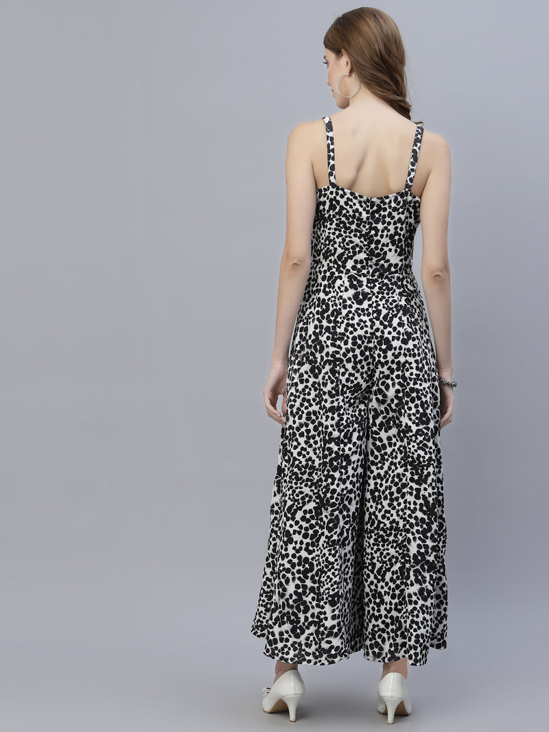 The Black Leopard Printed Fit and Flare Jumpsuit for Women is the perfect addition to any fashion-forward wardrobe. This jumpsuit features a bold and eye-catching leopard print, giving it an edgy and stylish look. The black color of the jumpsuit provides a timeless and versatile aesthetic, making it easy to dress up or down for any occasion.  The fit and flare design of the jumpsuit is incredibly flattering, accentuating curves in all the right places. 